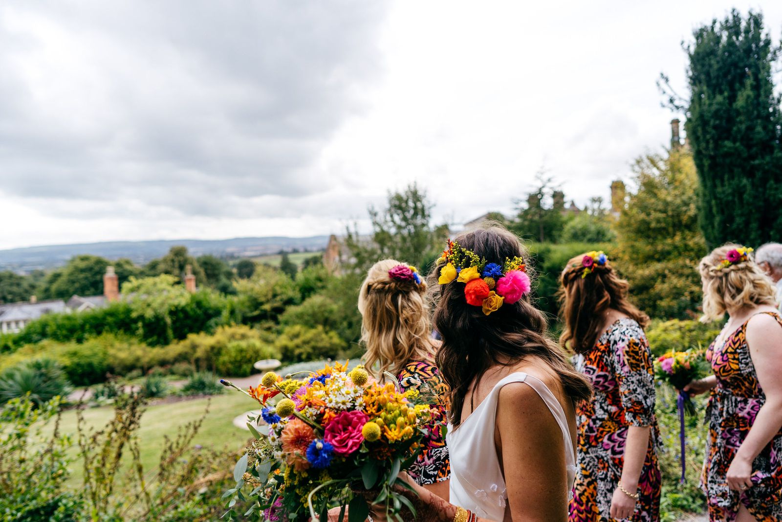 Jump behind the scenes of this balloon-filled, brightly coloured country house wedding in Somerset, complete with a dream outdoor ceremony in the temple.